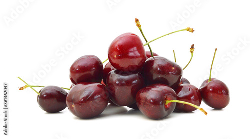 Canvas-taulu Handful of a red cherry on a white background