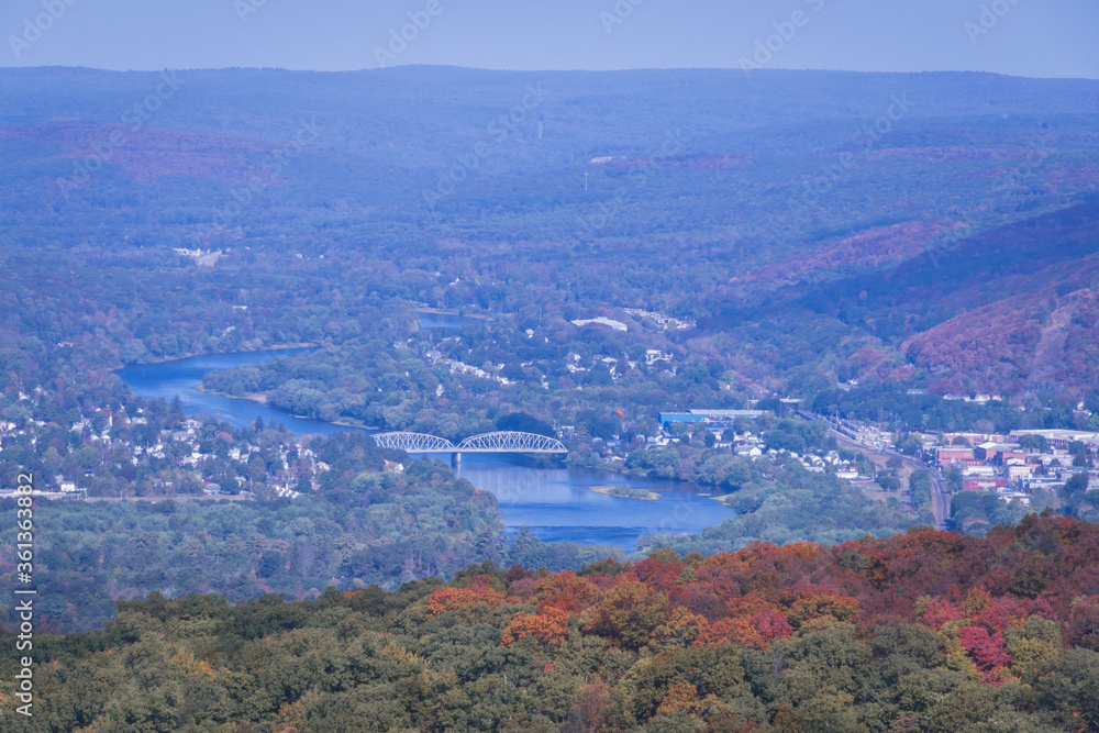 Tri state view from NJ Appalachian Trail Delaware River separates Port Jervis NY and Matamoras PA fall foliage
