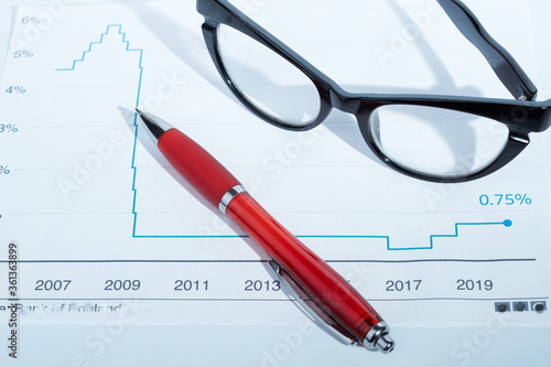 Electricity bill with pen and glasses to pay every month.