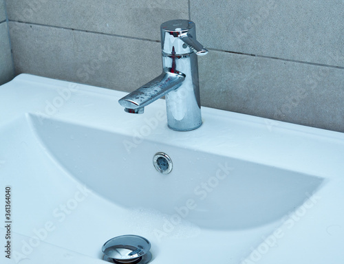 The photo of a sink in a bathroom