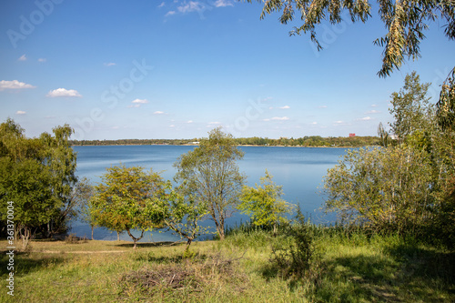 View of the recreation area Kulkwitzer See, a lake on the outskirts of the cities of Leipzig and Markranstädt. A paradise for swimmers, surfers, divers, cyclists and hikers.