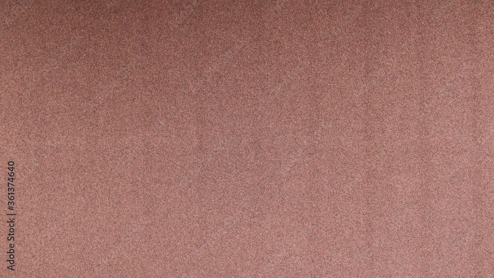 abstract brown paper background with noticeable grainy texture and light stripes abstract brown paper background with noticeable grainy texture and light stripes