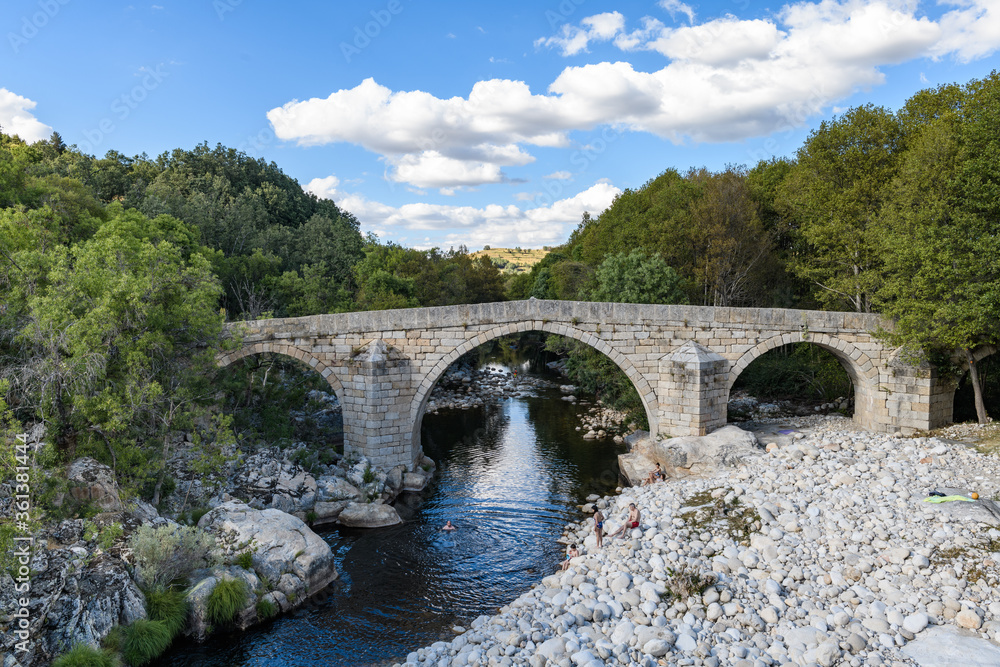 romanic bridge over the tormes river in the province of avila in the town of navalonguilla