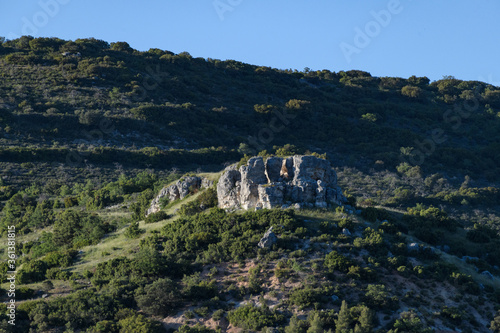 mountain with ancient celtic ruins on top in the town of Lupiana in the province of Guadalajara in Spain photo