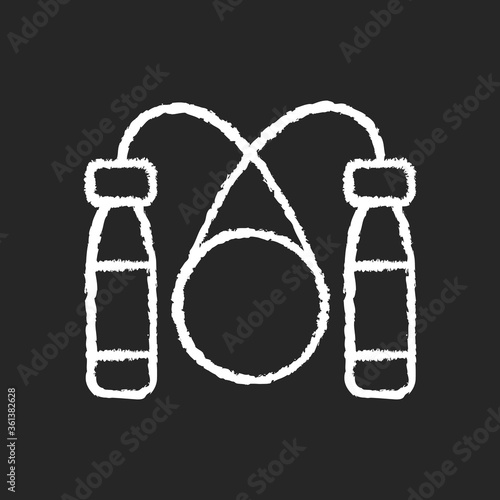 Jump rope chalk white icon on black background. Home workout equipment, healthy lifestyle. Sport gear for leg muscle and stamina training. Skipping rope isolated vector chalkboard illustration