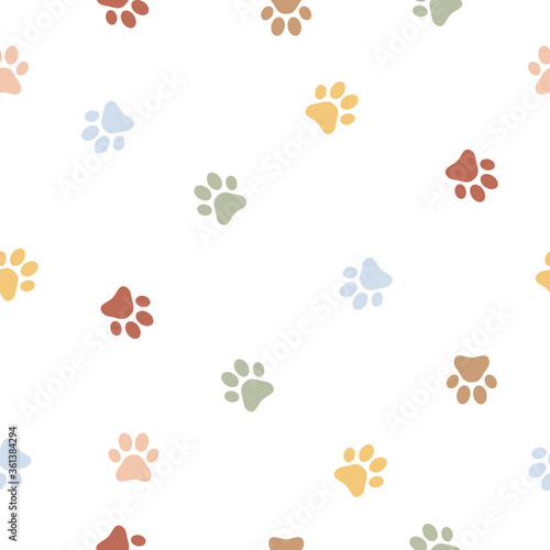 Colorful dog paw seamless pattern background. Animal footprint vector illustration on white.