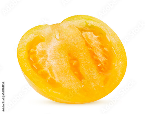 Fresh yellow tomato cut in half