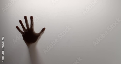 Silhouette. Hand appears. Abstract white background
