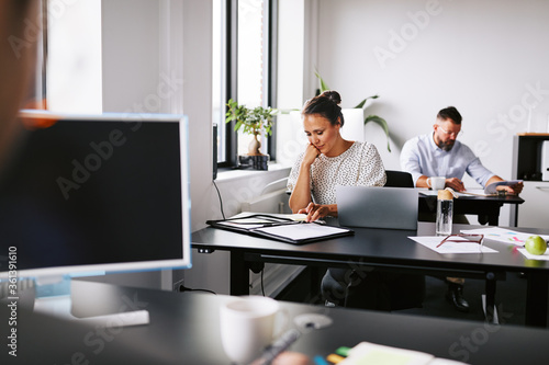 Businesswoman working at an office desk