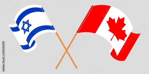 Crossed and waving flags of Israel and Canada