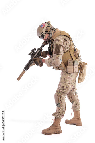 Portrait Of A Soldier Holding Gun against a white background. isolated. u.s. soldier