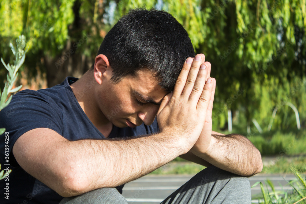 a person sits on the floor and praysa person sits on the floor of a treadmill and prays a person sits on the floor and praysa person sits on the floor of a treadmill and prays