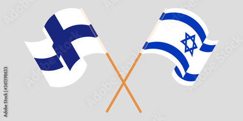 Crossed and waving flags of Israel and Finland