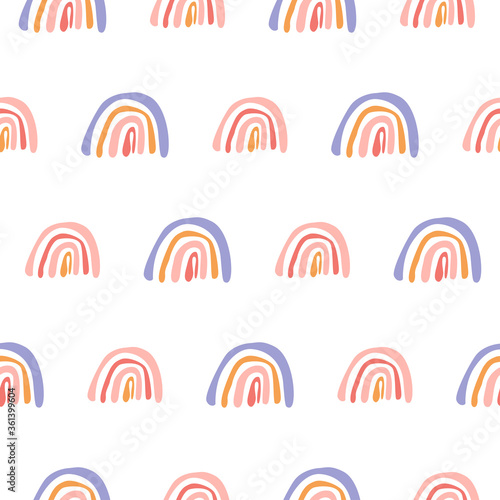 Seamless childish pattern with hand rainbows. Creative scandinavian texture for fabric, wrapping, textile, wallpaper, clothing. Vector flat illustration.