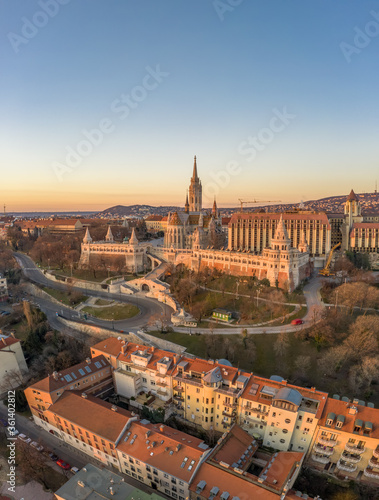 Aerial drone shot of Matthias Church on Buda hill during Budapest sunrise at dawn
