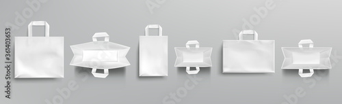 Paper shopping bags top and front view mockup, white packages with handles, blank rectangular ecological gift pack, isolated mock up for branding and corporate identity design, Realistic 3d vector set