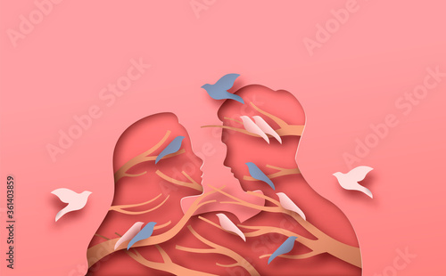 Man and woman couple with papercut bird tree