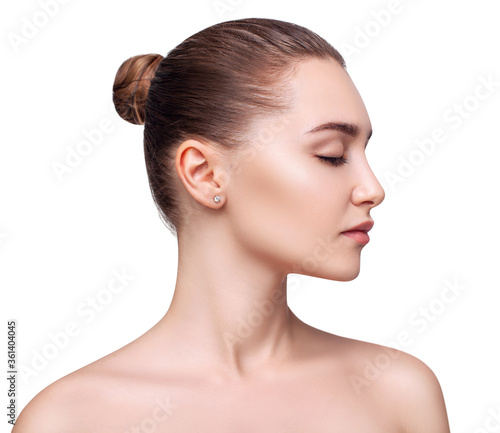 Beautiful sensual woman with closed eyes and perfect skin. Isolated on white background. photo