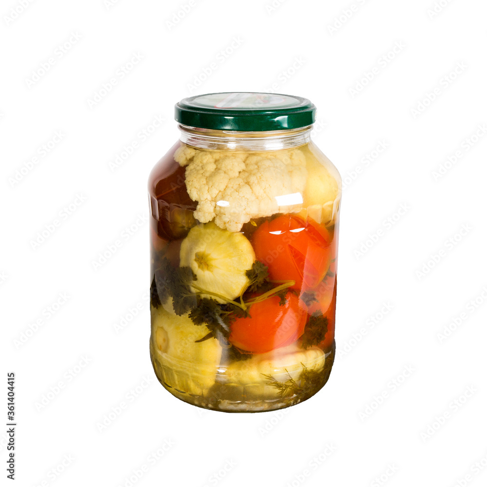Canned vegetables in a glass jar. Isolated on white background Canned vegetables in a glass jar. Isolated on white background