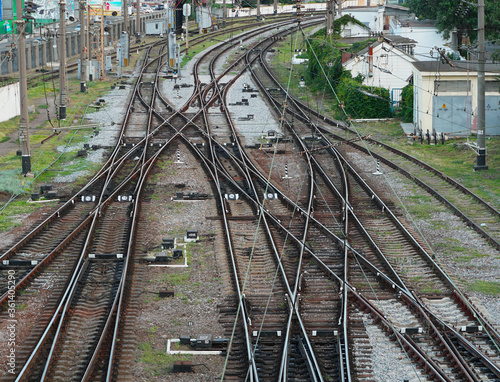 railroad tracks diverging in different directions