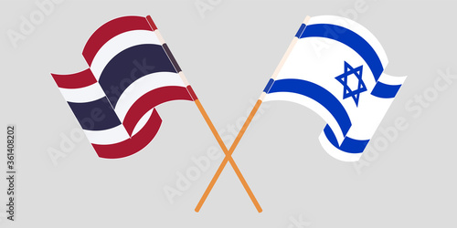 Crossed and waving flags of Israel and Thailand