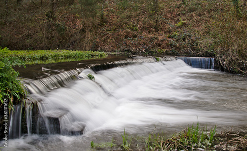River stream with rapids and high flow in autumn in Galicia mountain