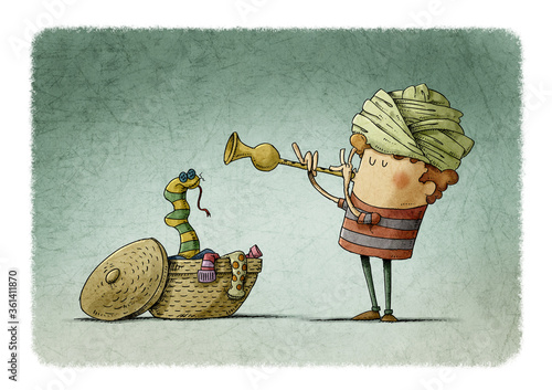 Foto boy with a turban on his head plays the flute and a snake-shaped sock comes out of a dirty laundry basket