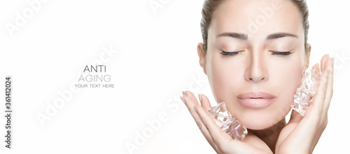 Spa Face Woman applies ice cubes on face. Healthy clean skin. Cold Beauty Treatments photo