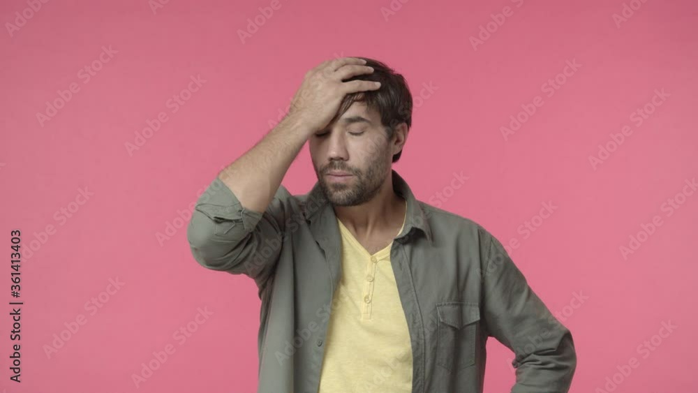 Troubled, distressed handsome bearded man slap forehead, facepalm and tousle hair, stuck in complicated situation, feel uneasy about bad thing work, standing indecisive and upset Troubled, distressed handsome bearded man slap forehead, facepalm and tousle hair, stuck in complicated situation, feel uneasy about bad thing work, standing indecisive and upset