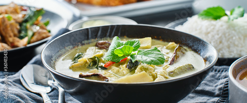 thai green curry with chicken and eggplant in bowl © Joshua Resnick