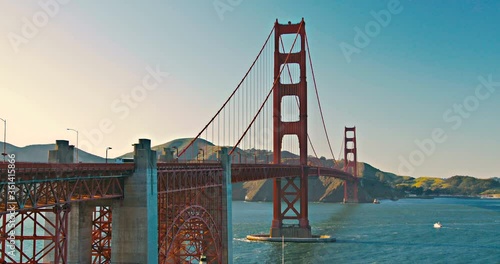 Golden Gate Bridge in San Francisco at sunset, commuters on the way home from work.