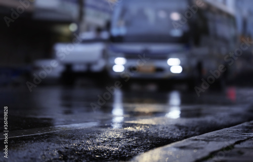 Night scene of hard rain fall in the city.Selective focus and shallow depth of field composition.