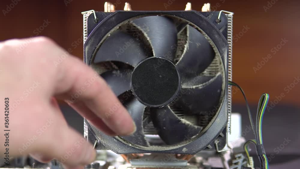 Demonstration of dust pollution. Dirty cooler and CPU heatsink from
