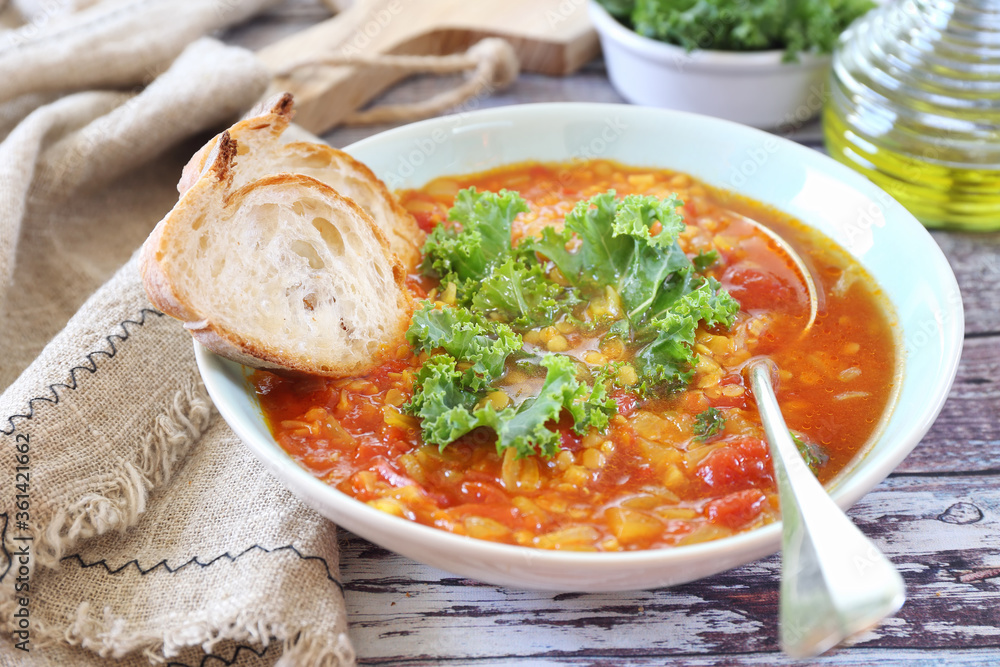 Spicy split pea soup with cabbage kale, olive oil and bread Spicy split pea soup with cabbage kale, olive oil and bread