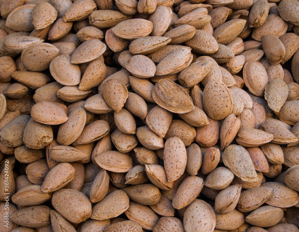 Many shelled almonds pattern background Many shelled almonds pattern background