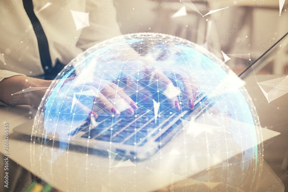 Multi exposure of woman hands typing on computer and business theme hologram drawing. Success concept.