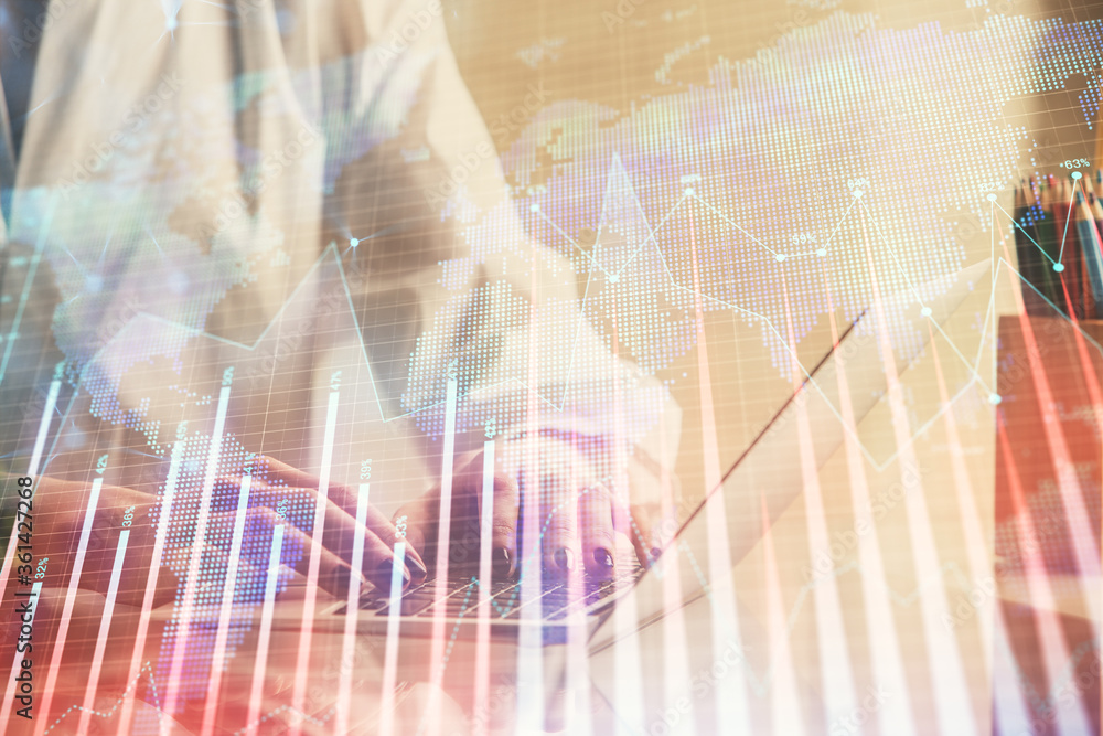 Double exposure of woman hands typing on computer and forex chart hologram drawing. Stock market invest concept. Double exposure of woman hands typing on computer and forex chart hologram drawing. Stock market invest concept.