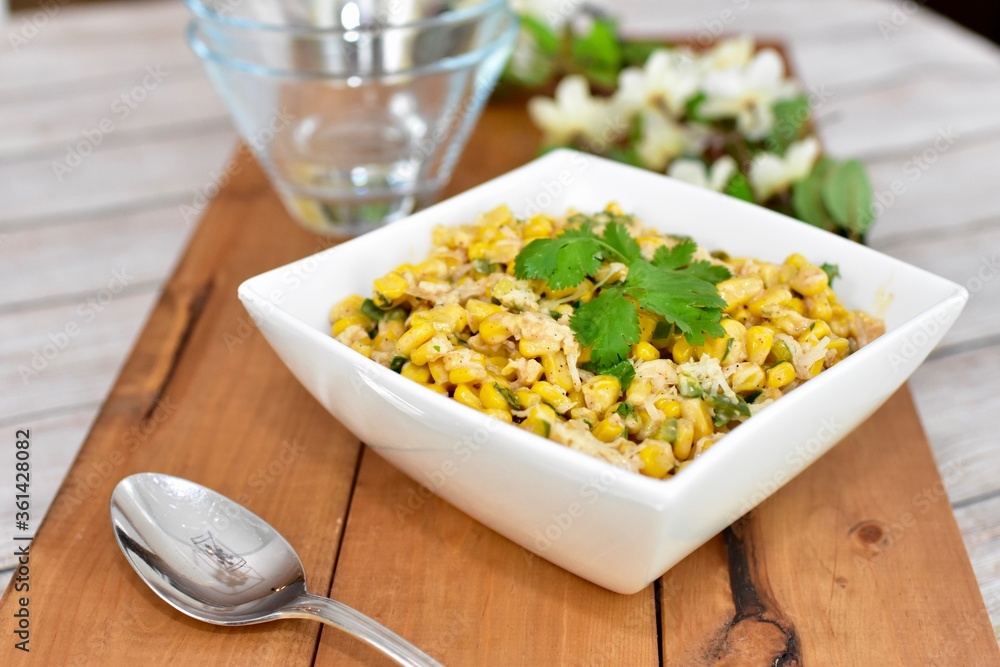 Homemade fancy Mexican street corn salad ready to share and eat from simple home meal kit Homemade fancy Mexican street corn salad ready to share and eat from simple home meal kit