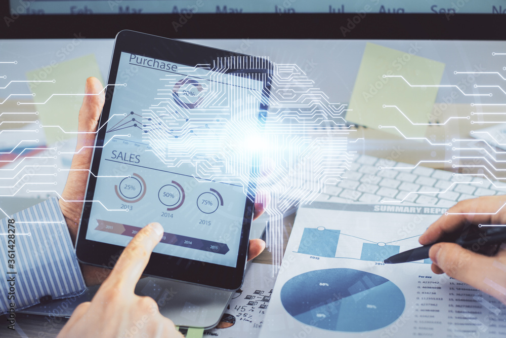 Double exposure of man's hand holding and using a digital device and brain hologram drawing. Data concept. Double exposure of man's hand holding and using a digital device and brain hologram drawing. Data concept.