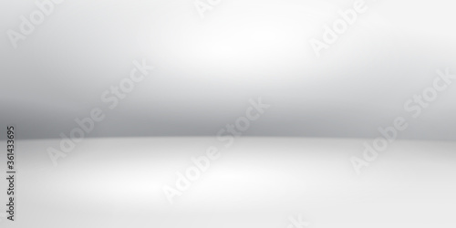 Empty studio background with soft lighting in white colors