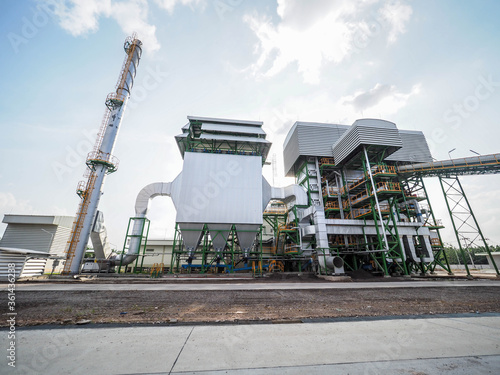 Canvas Print Biomass power plant with industrial energy concept.