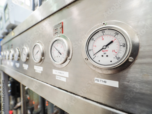 Pressure gauge of measuring instrument close up in industry zone at power plant with closed up photo