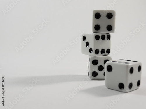 stacked dice on white background