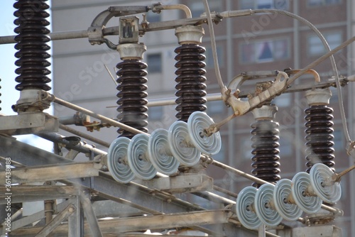 Glass isolators in electrical grid photo