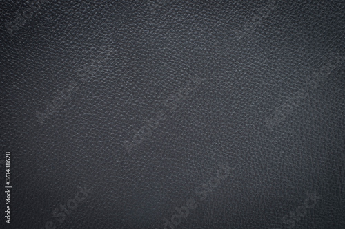 Black gray leather texture. Surface of rough abstract dark black matte background.