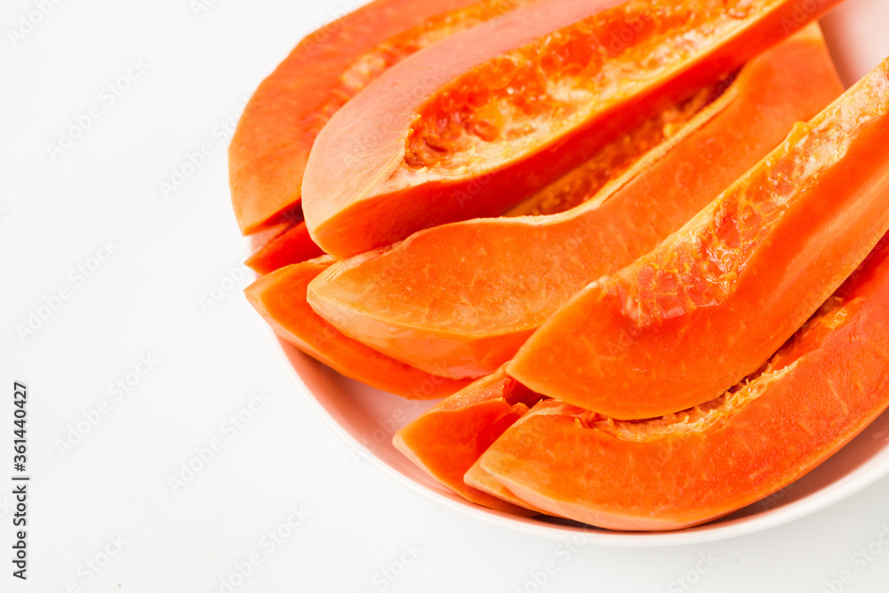Fresh papaya slice on the white background Fresh papaya slice on the white background