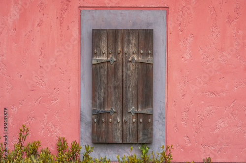 Small old door on european street corner