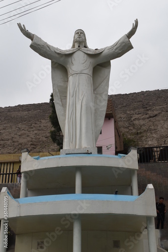 Swimming pool and statue of Cristo Blanco near Plaza de Chosica photo