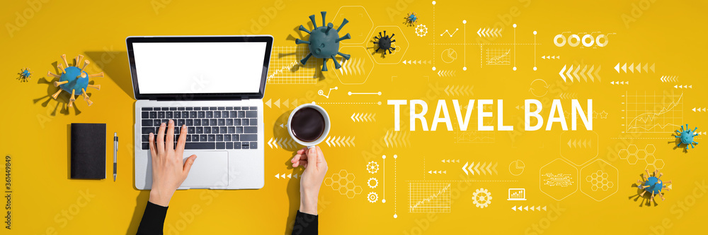 Travel Ban theme with person using a laptop computer Travel Ban theme with person using a laptop computer