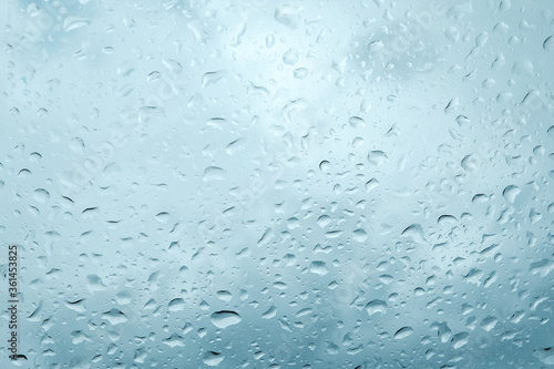 Rain drops on car window, Textures of water droplets of rain flow